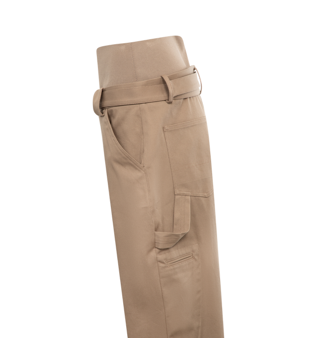 Image 3 of 3 - NEUTRAL - Alaia loose cargo trousers crafted from stretch cotton gabardine with a high waisted, figure hugging knit band, and a long belt with buckle. Made in Italy. 97% cotton, 3% elastane. 