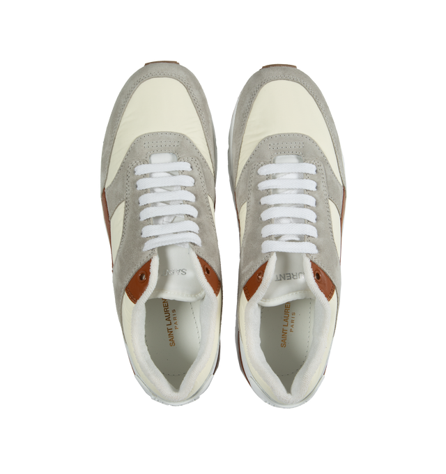 Image 5 of 5 - MULTI - SAINT LAURENT Bump Sneakers featuring low top, lace up, logo on tongue and back tab and rubber sole. 60% nylon, 40% calfskin leather.  