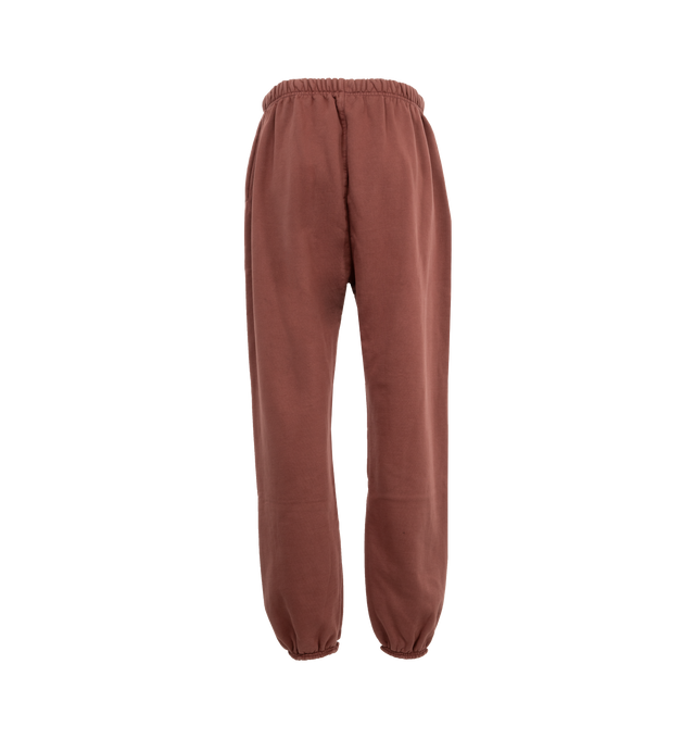 Image 2 of 3 - RED - Fear of God Fleece Drawstring Sweatpants have an elastic drawstring waist, side seam pockets, elastic hems, and logo details. 83% cotton, 17% recycled polyester fleece.  