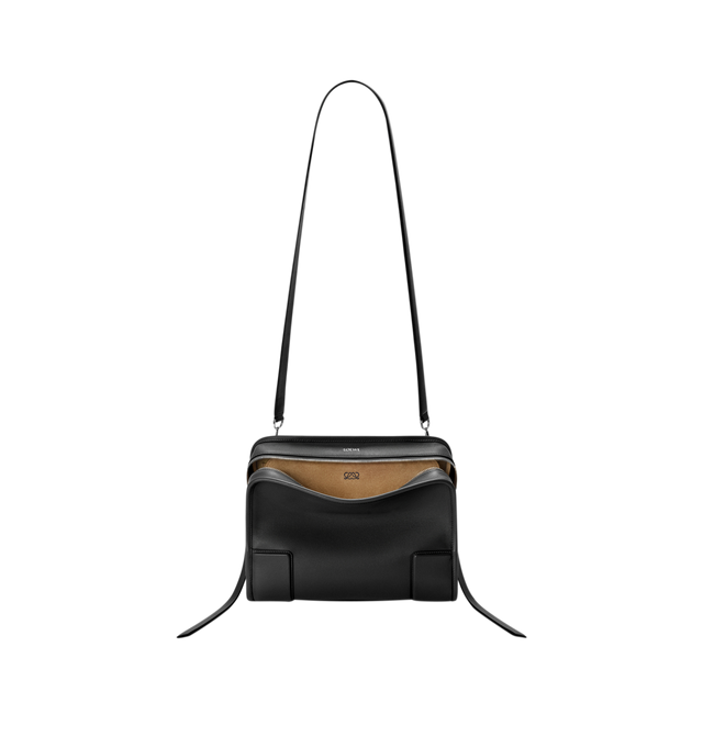 Image 11 of 17 - BLACK - Loewe Amazona Medium 180 Bag in soft calfskin leather featuring a relaxed silhouette with a single toron top handle, designed to be carried open, while a concealed closure secures the main compartment, removable shoulder and crossbody straps, zip closure with two leather zip pullers, two compartments, main compartment closed with magnetic closure, internal flat pocket, suede lining and embossed logo. Soft calfskin. Strap length 108 cm; Strap Drop 50 cm; Handle drop 11 - 28 cm; Heigh 