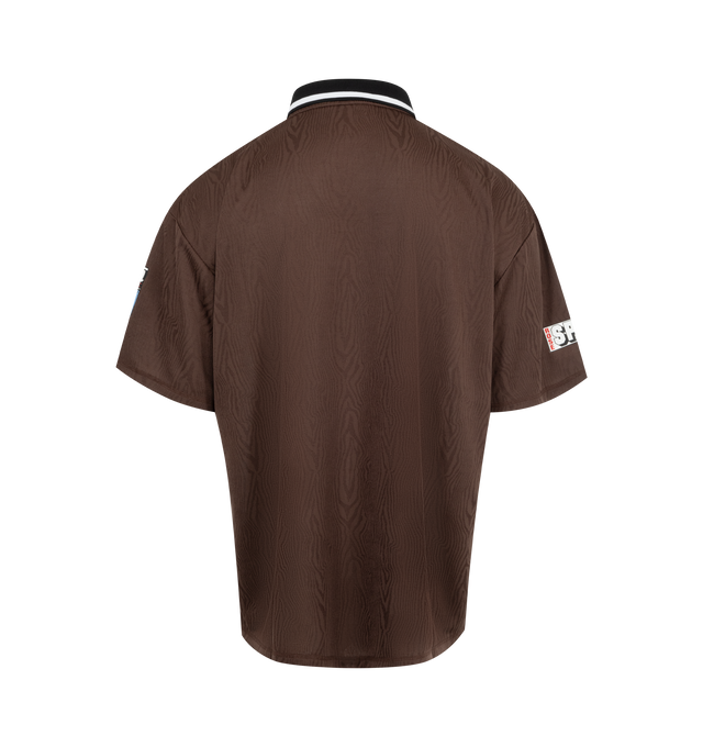 Image 2 of 2 - BROWN - Martine Rose loose fitting football top in brown jacquard moire jersey featuring Martine Rose graphics and embroidery, short sleeves, and black fold-down collar.   Unisex style in men's sizing. 100% polyester. 