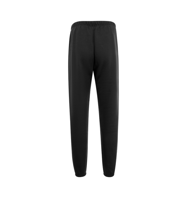 Image 2 of 3 - BLACK - Fear of God Nylon Military Trackpants have an elastic drawstring waist, side pockets, gathered ankles, and a leather log patch. 100% polyester. Made in Italy.  