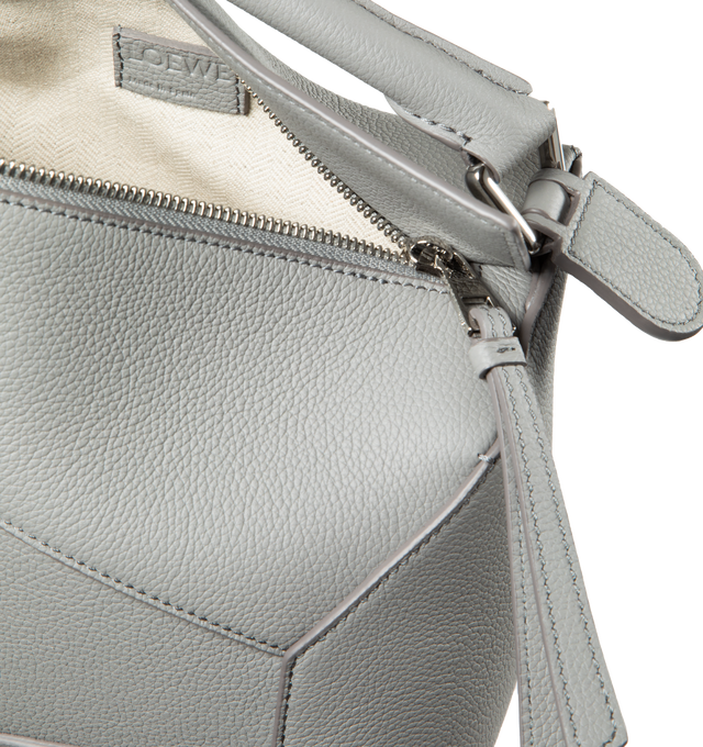 Image 3 of 3 - GREY - LOEWE Small Puzzle Bag has a zipper closure, removable and adjustable shoulder strap, exterior zip pocket, interior slip pocket, and embossed signature Anagram. Lined. 100% calf leather. Made in Spain.  