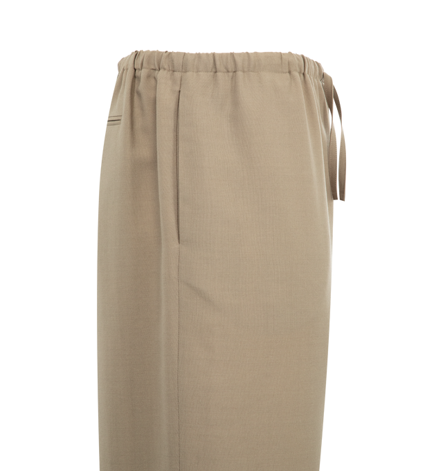 Image 3 of 3 - NEUTRAL - THE ROW Donatello Pant in Wool and Mohair featuring relaxed wide leg, side seam pockets, zipper fly, and elasticated waistband with drawstring closure. 75% wool, 25% mohair. Made in Italy. 