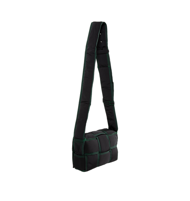 Image 2 of 3 - BLACK - BOTTEGA VENETA Small Padded Tech Cassette Bag featuring cross-body bag in lightweight padded nylon Intreccio with edge stitching detail, single interior zipped pocket and magnetic closure. 5.5" x 9.1" x 3". Polyamide. 