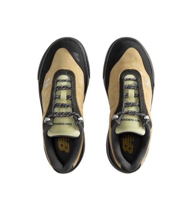 Image 5 of 5 - NEUTRAL - New Balance Unisex TL900 is crafted with a suede and mesh upper and features a trail walking-inspired design that draws from New Balance's outdoor heritage. This modern update to a classic trail walking boot balances everyday comfort with rugged versatility, while a contemporary hardware N logo adds a distinctive finishing touch. Designed for daily wear and outdoor exploration alike, the silhouette delivers a supportive and comfortable feel throughout the day. Upper: Suede and Mesh. 