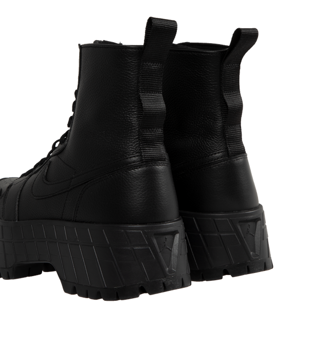 Image 3 of 4 - BLACK - Air Jordan 1 Brooklyn Boots are sneaker-inspired, rugged lace-up boots with Nike Air cushioning, soft foam collars, perforated toe boxes, and elevated rubber outsoles.  