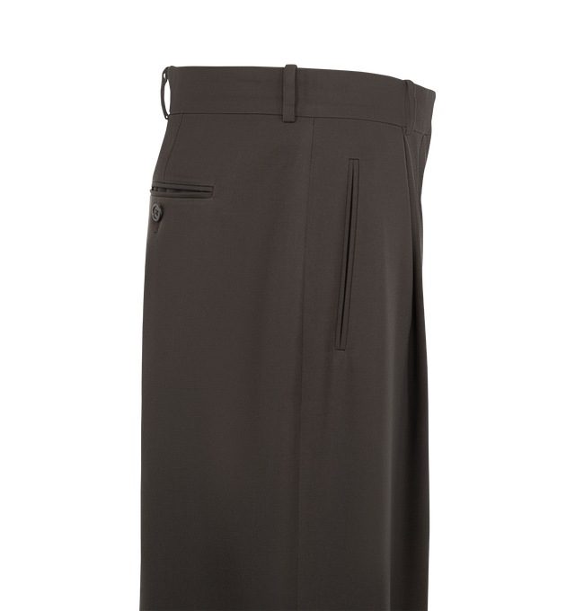 Image 3 of 3 - BROWN - The Row Women's Lowe Pant is crafted from structured virgin wool and features a tailored silhouette that sits at the hip with a straight, wide-leg cut. Designed with a single front pleat, side besom pockets, and a single back besom pocket, this refined trouser embodies The Row's signature approach to understated luxury and precise tailoring. Main Material: 100% Virgin Wool. Made in Italy. 