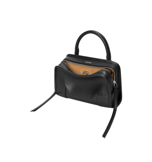 Image 3 of 11 - BLACK - Loewe Mini Amazona 180 Bag in leather features a relaxed silhouette anchored by a single toron top handle, designed to be carried open, while a concealed closure secures the main compartment, removable shoulder and crossbody straps, two carry options: short handle, removable and adjustable crossbody strap, zip closure with two leather zip pullers, two compartments, main compartment closed with magnetic closure, left side d-ring for customization, suede and nappa lambskin lining, and  