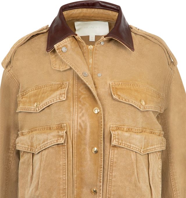 Image 4 of 4 - BROWN - RUADH The Henderson Jacket featuring a swing silhouette, leather collar, signature gold branded RADH hardware details, crafted in regenerative cotton canvas, exaggerated sleeve shape, drop shoulder, two way zipper with branded snap closure  and bound seams at interior. 100% regenerative cotton canvas. Made in the USA. 