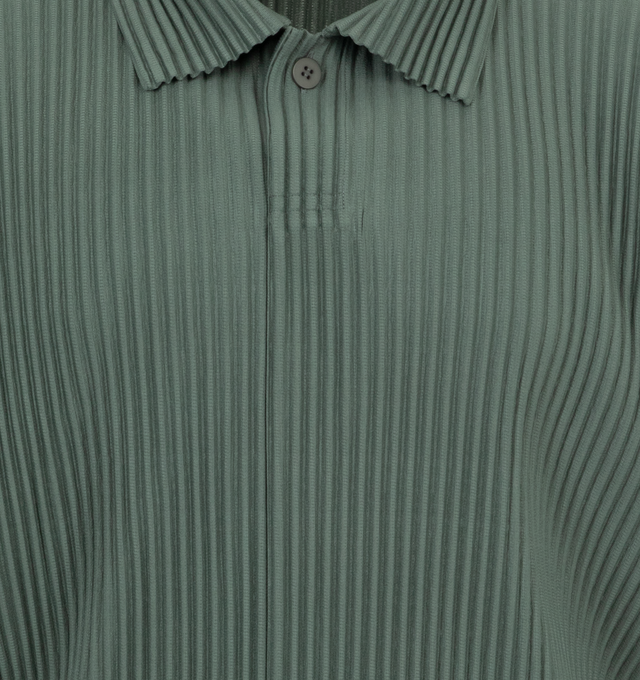 Image 3 of 5 - GREEN - Homme Plisse Issey Miyake solid polo shirt with allover pleating featuring spread collar, hidden two-button placket, long sleeves, relaxed fit, pullover style. Made in Japan. Polyester 100%. 