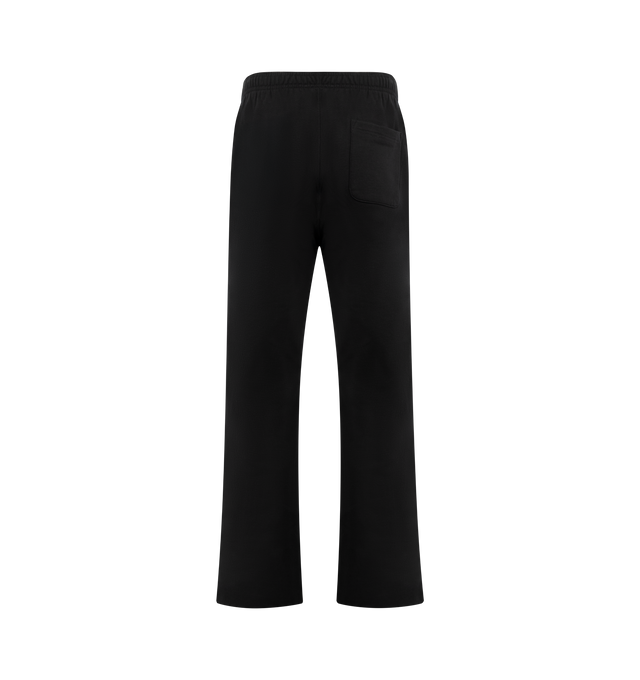 Image 2 of 4 - BLACK - PLEASURES Pipe Sweatpants featuring elastic waist with concealed drawstring, side pockets, loose fit, logo down leg and toggle at hem. Cotton. 