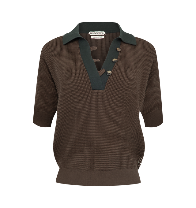 Image 1 of 2 - BROWN - JW Anderson Women's Knitted Polo Top is crafted from a lightweight cotton, cashmere, and polyamide blend and features a short-sleeve silhouette in a textured waffle stitch knit. Designed with a tonal collar and placket, button-front detailing, and a signature loop detail inspired by the brand's tipped bomber jacket for a refined yet contemporary finish. Main Material: 88% Cotton, 9% Cashmere, 3% Polyamide. Made in Italy. 