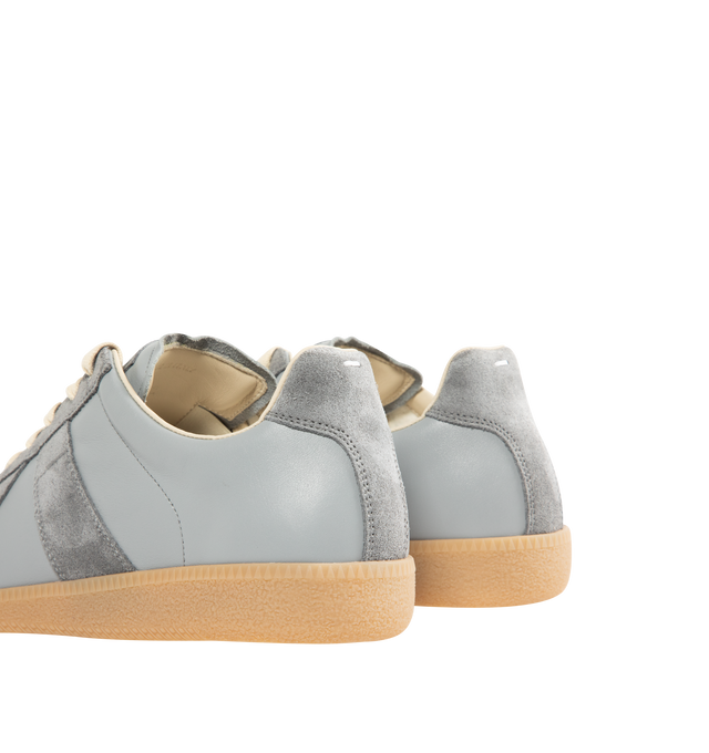 Image 3 of 5 - GREY - MAISON MARGIELA Replica Sneakers featuring lace-up sneakers in buffed nappa calfskin and calfskin suede, contrasting sole, Maison Margiela logo label on the tab, internal Replica label, internal elastic and all-over Maison Margiela logo insole. 100% calf leather. Sole: 100% rubber. Made in Italy. 