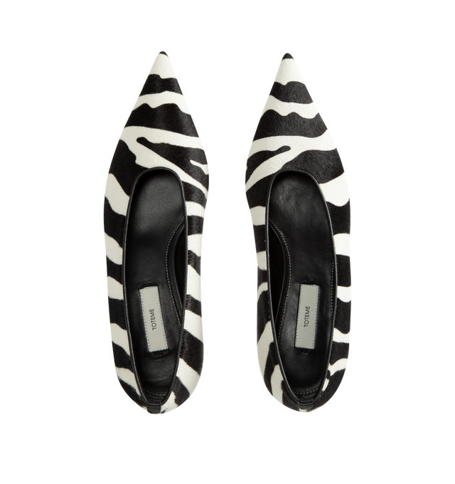 Image 4 of 4 - MULTI - Toteme Women's Zebra Print Pumps are crafted from a printed pony hair-effect calf leather and features a sharp, elongated toe and a low kitten heel. This statement style is finished with a leather lining, insole, and sole. Main Material: 100% Calf Leather. Lining: 100% Sheep Leather. Sole: 100% Cow Leather. Heel Height: 35 mm / 1.4 in. Toe: Elongated Pointed Toe. Color: Tiger. Made in Italy. 