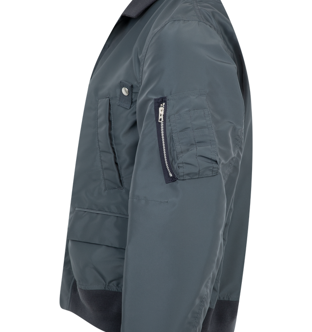 Image 3 of 3 - BLUE - Sacai Men's Jacket crafted from Nylon and Cotton/Polyester twiLl with 100% Polyester lining + fill. Features button and zip closure, rib knit trims, open collar, zip pocket at sleeve and 2 flap and welt pockets at front. 