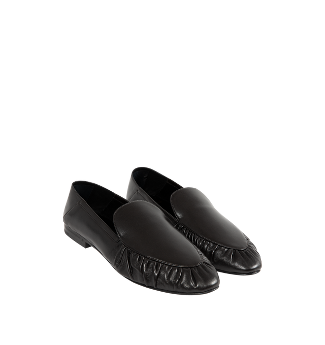 Image 2 of 4 - BLACK - SAINT LAURENT Alain Slippers featuring an almond gathered moc toe, a flexible heel counter that may be worn up or folded down and leather sole. Lambskin. Made in Italy. 