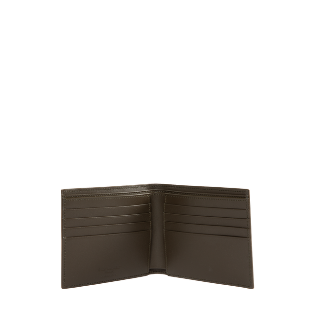 Image 3 of 3 - BROWN - SAINT LAURENT East West Wallet featuring single-fold wallet with embossed signature, leather lining, silver-toned hardware, eight card slots, two bill compartments and two receipt compartments. 4.5" x 3.7" x 0.6". Calfskin leather. Made in Italy. 