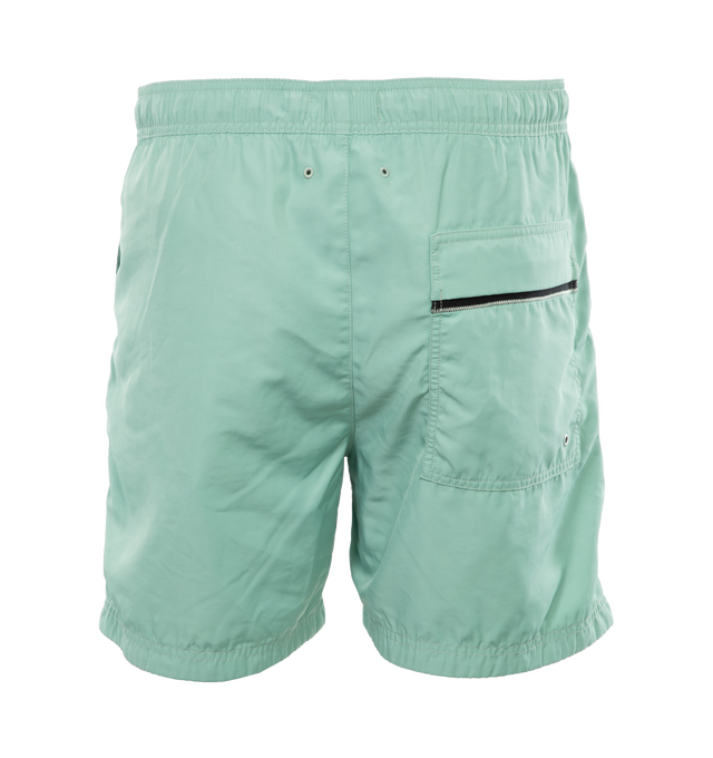 Image 2 of 4 - GREEN - STONE ISLAND Swim Trunks featuring regular fit, patch hand pockets with slanting opening edged with inner tape, back patch pocket with fixed flap and hidden zipper closure with nylon trim, Stone Island Compass patch logo on the left leg, inner mesh lining and elasticized waistband with outer drawstring set on tap tab. 100% polyester. Lining: 100% polyamide/nylon. 