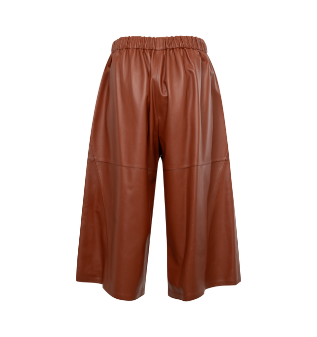 Image 2 of 3 - BROWN - LOEWE Cropped Trousers featuring relaxed fit, mid waist, wide leg, cropped length, elasticated waist, side pockets, half lined and Anagram embossed patch pocket placed at the back. Leather. Made in Spain. 