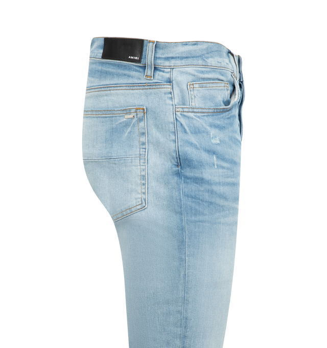 Image 3 of 3 - BLUE - Amiri Starburst Applique Skinny Jeans are a 5-pocket style with a button and zip fly, distressing, signatStarburst Applique Skinny Jeans (Mens) ure brand logo appliques on the left leg, and a regular rise. Cotton, polyester, elastane. Made in USA.  