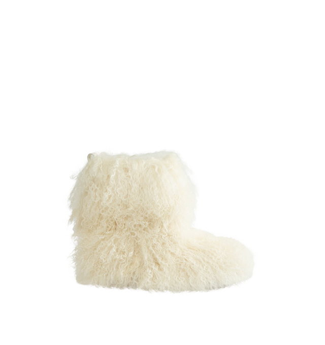 Image 1 of 4 - WHITE - UGG Women's Classic Short Fluff Momma Boot is crafted from long sheepskin and features a statement short-boot silhouette, an 8-inch shaft, and a rear pull tab. Designed with plush UGGplush lining and sockliner for comfort and warmth, this style is finished with a lightweight sugarcane EVA outsole and recycled polyester textile binding. Main Material: Long Sheepskin. Vamp Lining: 17mm UGGplush (60% Upcycled Wool, 40% TENCEL Lyocell). Shaft Lining: Textile. Sockliner: 17mm UGGplush (60% 