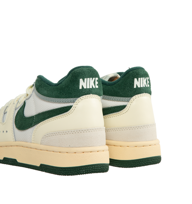 Image 3 of 5 - MULTI - Nike Attack iconic '80s style tennis sneaker with crisp leather, durable textile, padded collar and checkered tongue label. "Coconut Milk and Pale Vanilla" with "Fir" green swoosh and collar details. 