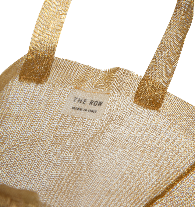 Image 3 of 3 - GOLD - THE ROW Imogen Mini Tote Bag in Steel featuring semi-transparent steel with two flat top handles and single interior compartment. Unlined. 6 x 2 x 7.5 in. Handle: 3.5 in. drop. 87% steel, 13% polyester. Made in Italy. 
