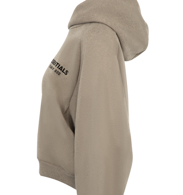 Image 3 of 3 - GREY - Fear of God Essentials Womens cropped, hooded sweatshirt in a pullover style with long sleeves, two slip pockets at front, embossed brand print at front and back, and ribbed trims. 80% cotton, 20% polyester.  