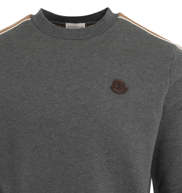 Image 3 of 3 - GREY - MONCLER SIDE-STRIPE LOGO SWEATSHIRT has contrasting side stripes, a crew neckline, leather logo patch at chest, banded cuffs and hem, is unlined and a pullover style.  