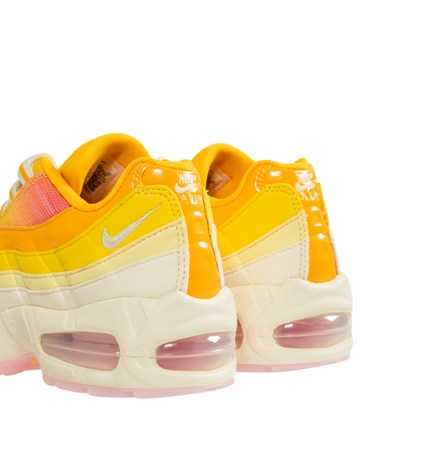 Image 3 of 5 - YELLOW - NIKE Air Max 95 Big Bubble Sneaker featuring distinctive wavy design, textile and synthetic leather, visible Max Air cushioning, flex grooves in the midsole and outsole, foam midsole and rubber outsole. 