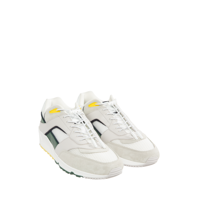Image 2 of 5 - WHITE - SAINT LAURENT Bump Sneaker featuring low-top drawstring laced sneakers with a rubber SAINT LAURENT signature on the tongue and back tab. Calfskin, fabric. Made in Italy. 
