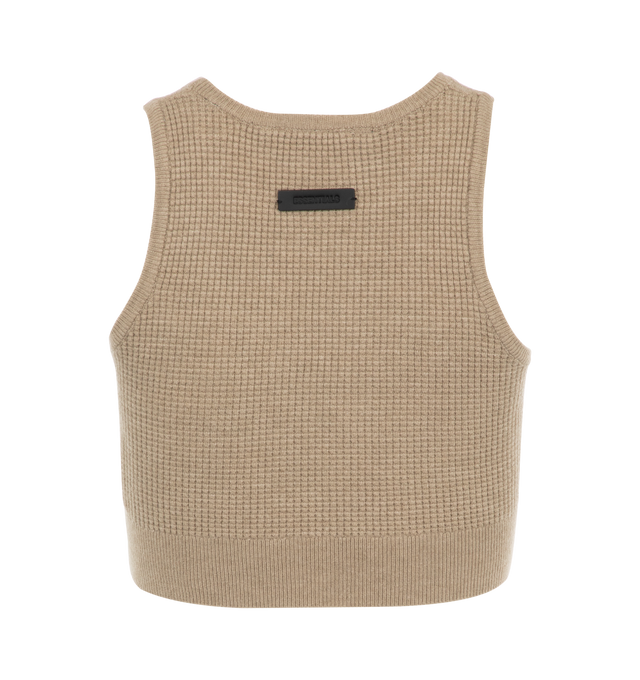 Image 2 of 2 - NEUTRAL - Fear of God Essentials Women's Waffle Tank is made of a poly-nylon knit for stretch comfort and texture. The slim fit tank is designed to be a versatile stand-alone or layering piece. An Essentials Fear of God rubberized label is stitched at the back collar. 88% polyester, 12% nylon waffle knit. 