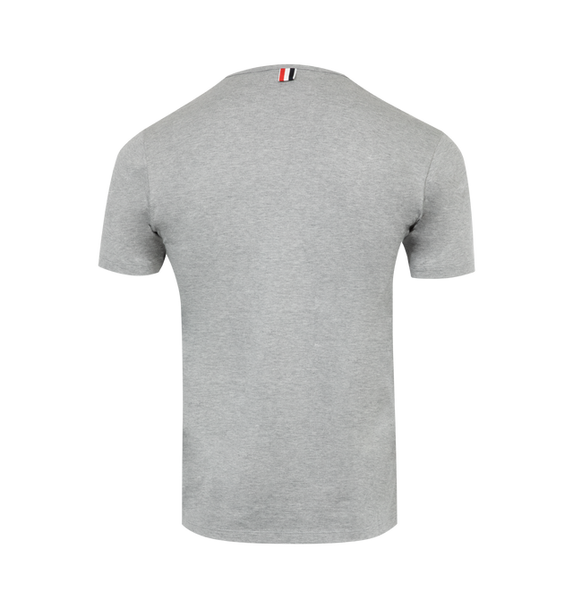 Image 2 of 2 - GREY - THOM BROWNE jersey t-shirt with crewneck collar, short sleeves, buttons at hem and striped detail at chest pocket. Made in Italy. 