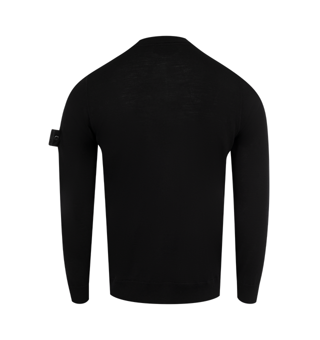 Image 2 of 3 - BLACK - STONE ISLAND Crew Neck featuring thinly ribbed neckline, overlock seams on shoulders and armholes, Stone Island Ghost badge on the left sleeve, ribbed cuffs and bottom band and regular fit. 100% virgin wool. 