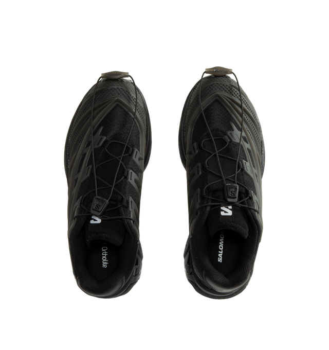 Image 5 of 5 - BLACK - Salomon Unisex XT-EVO Sneakers are built with a synthetic and textile upper and are made to be a performance-driven combining stability and cushioning for lasting comfort. Additional details include Quicklace one-pull lacing, endoFit internal sleeve construction, sensiFIT support, seamless construction, and a lace pocket for streamlined wear. A molded OrthoLite sockliner and Mud ContaGRIP rubber outsole enhance cushioning, durability, and traction across varied terrain. Upper: Synthet 