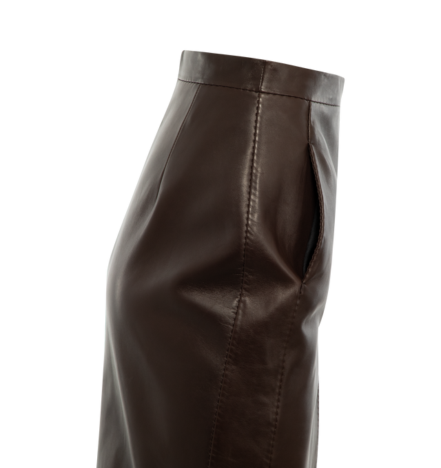 Image 3 of 3 - BROWN - Saint Laurent pencil skirt with overstitched panels, featuring a front slit, concealed pockets, silk lining, concealed back zip closure, two concealed pockets at the side. 100% lambskin. Made in Italy.  