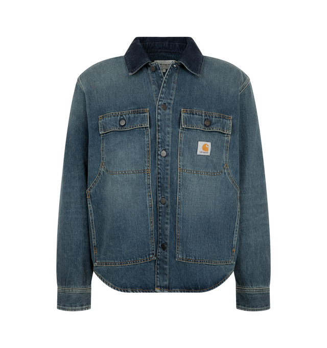 Image 1 of 3 - BLUE - Carhartt WIP Men's Oakland Shirt Jacket is crafted from heavyweight Camano denim and features an unlined construction, a corduroy collar, and a button-front closure with branded buttons. Inspired by the utility details of the brands Double Knee Pant, it is designed with two button-flap chest pockets, kangaroo pockets, bartack reinforcements at key stress points, and a woven Square Label. Main Material: 100% Cotton Camano Denim. 