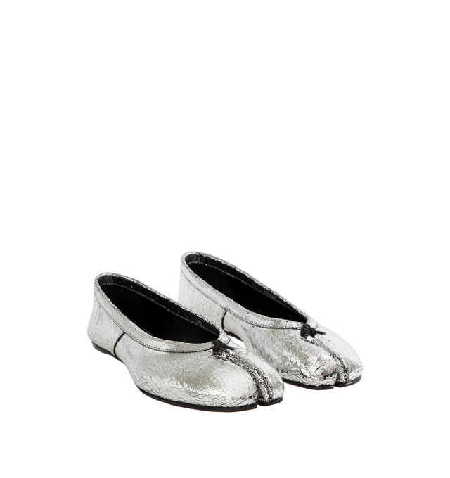 Image 2 of 4 - SILVER - Maison Margiela Tabi new ballerinas in a broken mirror finish, crafted from soft nappa leather.  Featuring white stitch detail at the back, cotton knot, Maison Margiela logo on the sole, and the Tabi split-toe shape, inspired by the traditional 15th century Japanese sock bearing the same name. Upper: 100% calf leather, Lining: 100% calf leather, Sole: 100% calf leather, Contrast: 100% rubber. Made in Italy. 