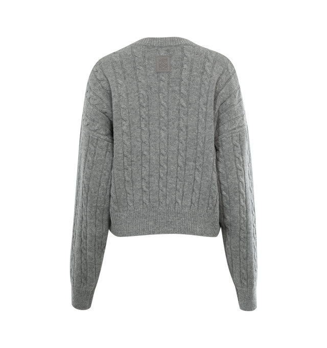 Image 2 of 2 - GREY - Loewe Hand knitted sweater crafted in medium-weight cable wool knit. Features a relaxed fit, short length, round neck, ribbed collar, cuffs and hem, dropped shoulders with LOEWE Anagram rubber patch placed at the back. Wool. Made in Italy. 