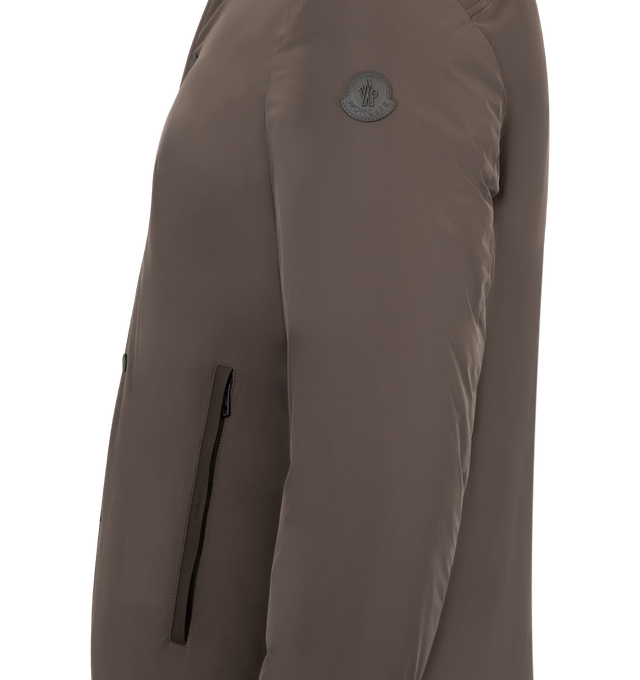 Image 3 of 3 - BROWN - MONCLER Gascogne Down Shirt Jacket featuring water-repellent main fabric, Airsoft lining, down-filled, zip and snap button closure, zipped pockets with nubuck trim, zipped inner and patch pockets, adjustable cuffs, fabric description label and leather logo patch. 100% polyester. Padding: 90% down, 10% feather. Made in Romania. 