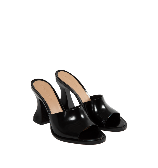 Image 2 of 4 - BLACK - BOTTEGA VENETA Cha-Cha Patent Leather Mules featuring slip on, curved block heels and rounded toes. 100% calfskin. 