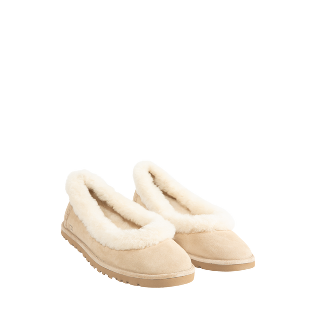 Image 2 of 4 - NEUTRAL - UGG women's Zora ballet flat crafted with a suede upper, plush sheepskin and lamb sockliner, a lightweight sugarcane EVA outsole, UGG Logo, heat-embossed and woven label with The UGG Logo on insole. 