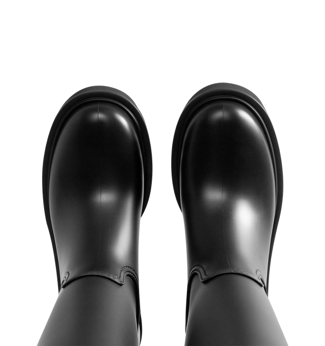 Image 4 of 4 - BLACK - Moncler Women's Kickstream High Rain Boots are crafted from waterproof PVC and nylon and feature a minimalist knee-high silhouette designed to protect against wet weather. Finished with a drawstring fastening, fabric insole, TPU welt, and lightweight EVA tread, these designer rain boots combine practical weather protection with Moncler's refined sporty aesthetic. Upper: 100% Polyvinyl Chloride. Lining: 80% Polyamide/Nylon, 20% Elastane/Spandex. Sole: 100% Polyvinyl Chloride. Calf Heig 