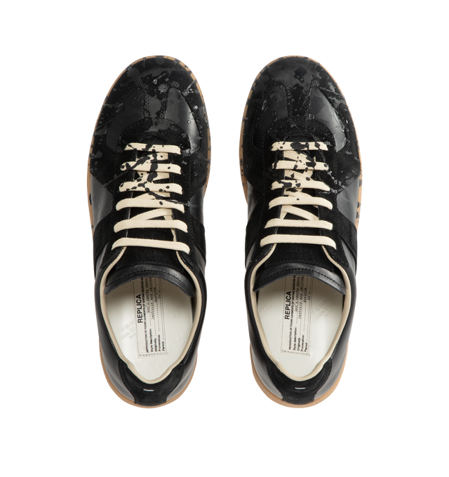 Image 5 of 5 - BLACK - MAISON MARGIELA Replica Sneakers featuring a classic low-top silhouette, contrast of matte leather and a patent sprayed finish, paint splatter detail, lace-up construction and rubber sole. Made in Italy. 
