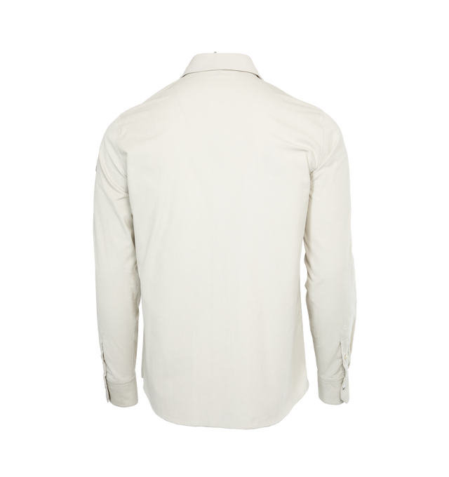 Image 2 of 3 - WHITE - MONCLER Corduroy Shirt featuring collar, snap button closure, mother-of-pearl buttons on collar and cuffs, chest pocket, adjustable cuffs and fabric logo patch. 100% cotton. Made in Romania. 
