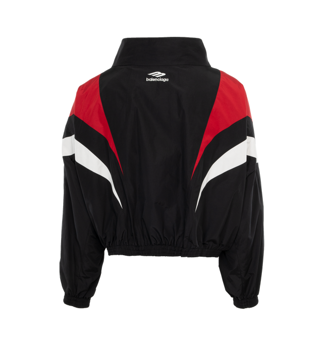 Image 2 of 3 - RED - BALENCIAGA Tracksuit Jacket featuring paneled construction, designed to be worn off the shoulder, double-ended zip fastening, 2 zipped slash pockets, elasticated cuffs and waistline and 3B sports icon artwork embroidered at chest and back. 52% cotton, 48% polyamide. Made in Italy. 