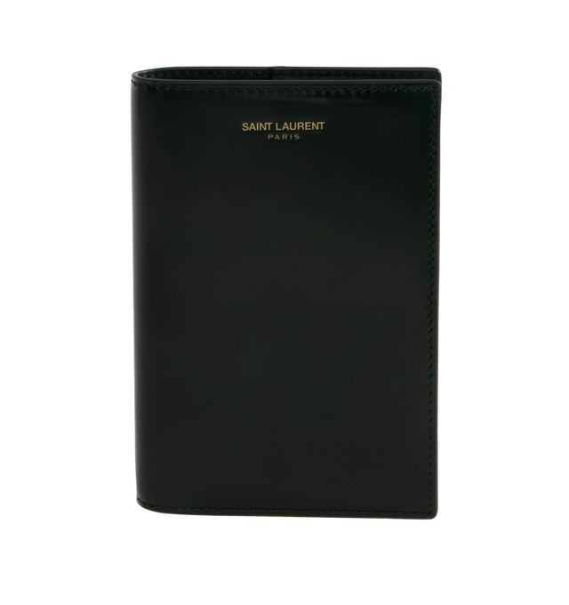 Image 1 of 3 - BLACK - SAINT LAURENT Passport Holder featuring two passport inserts, four card slots, leather lining and logo on front. 3.9 x 5.5 x 0.6 inches. Calfskin. Made in Italy. 