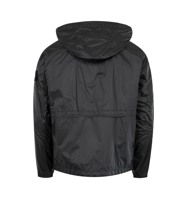 Image 2 of 3 - BLACK - STONE ISLAND featuring hood with visor and elasticated drawcord at contour and back, shaped front yoke with raglan sleeves, angled chest pocket with zipper, bellows hand pockets with flap and concealed double snap, vents on back, Stone Island badge on left sleeve, elasticated cuffs, elasticated drawcord at hem and two-way zipper fastening. 100% polyamide/nylon. 