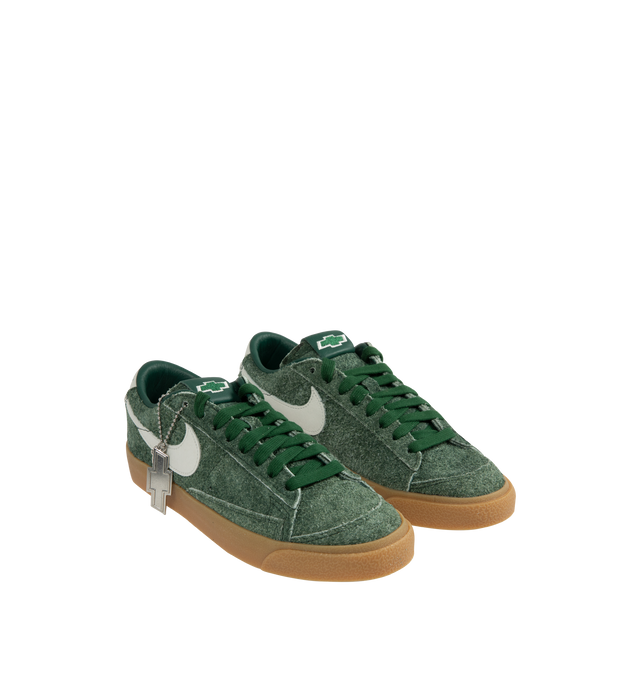 Image 2 of 5 - GREEN - NIKE Blazer Low Devin Booker Chevrolet Team Sneaker featuring supple leather upper in a vibrant hue, signature Booker details, including his jersey number on the heel, low-top silhouette, foam midsole and rubber outsole. 